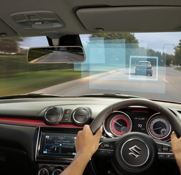 Swift Sport view out front windscreen with hands on the wheel