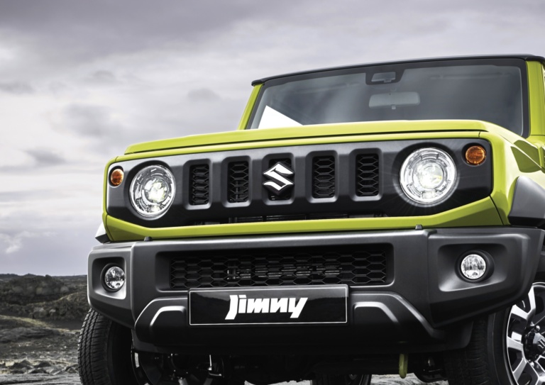 Yellow Jimny grille with prominent round headlights