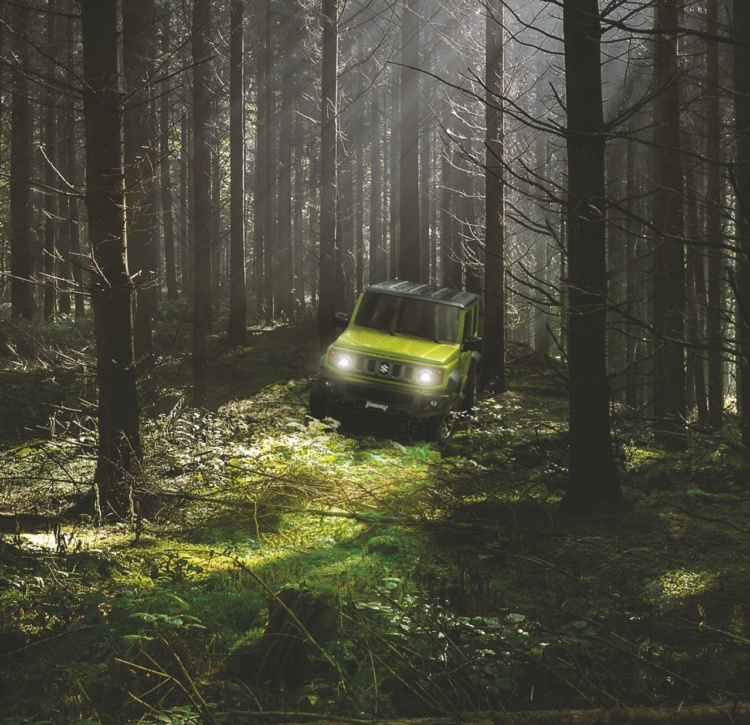 Jimny driving in woods